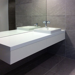  900 Blendstone tiles to length and enlarge a small indoor bathroom