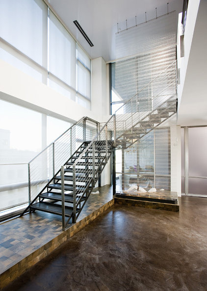 industrial staircase by MusaDesign Interior Design