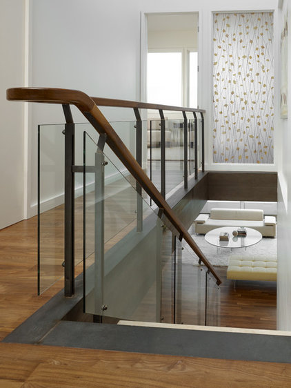 rustic staircase by John Maniscalco Architecture