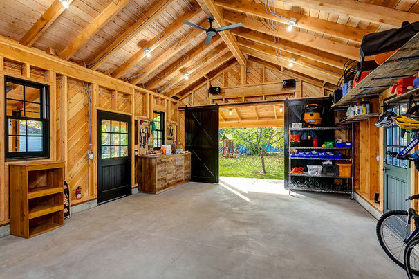 Rustic Garage And Shed by King Building &amp; Remodeling LLC