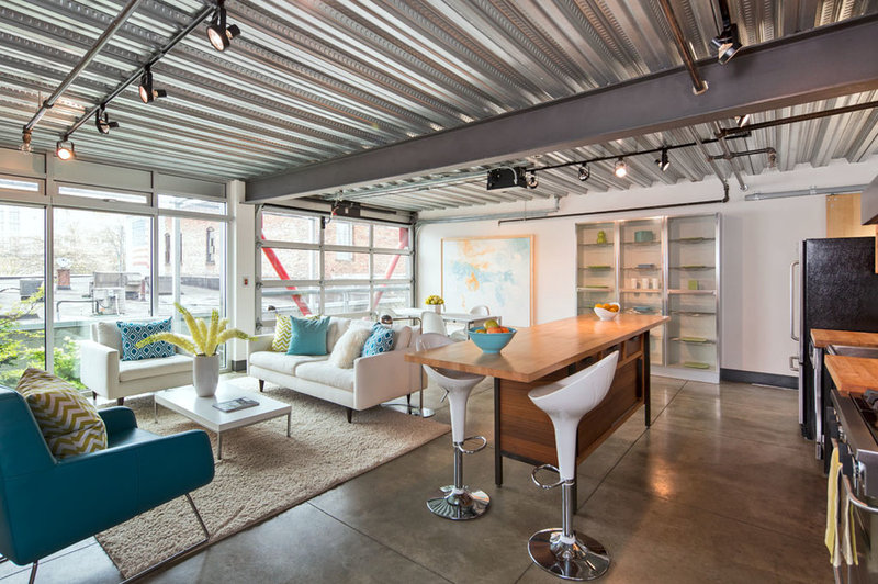 Industrial Living Room by David Robertson Design, LLC