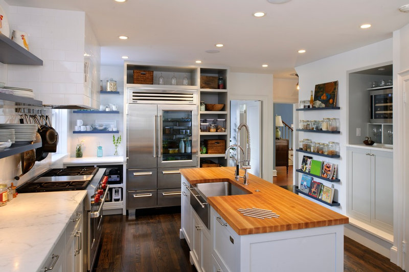 transitional kitchen by Pinemar, Inc