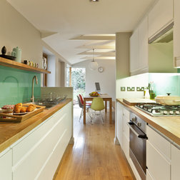 Kitchendesign on Garden Access And A Bright Green Backsplash Bring Color And Light To
