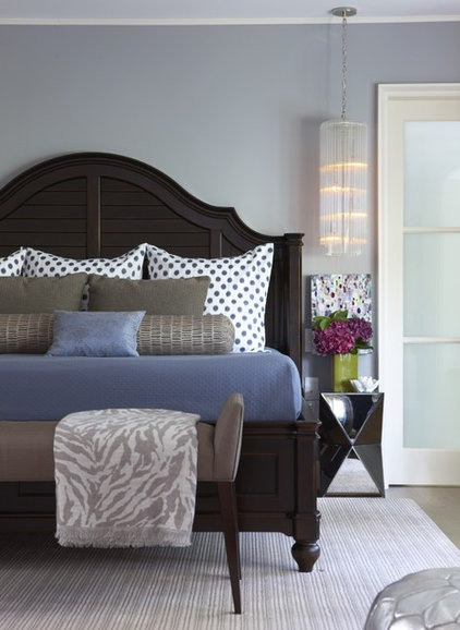 contemporary bedroom by Rachel Reider Interiors, brown bedframe, blue blanket. Blue, black/white polka dot & gray pillows