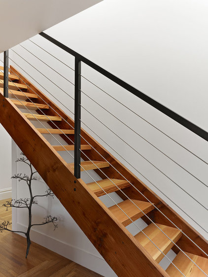 Modern Staircase by Neill and Lee Contractors