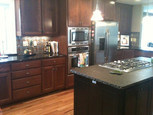 How can I brighten up my dark kitchen? My kitchen has black ...