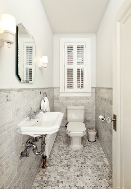 Traditional Powder Room by Four Brothers LLC