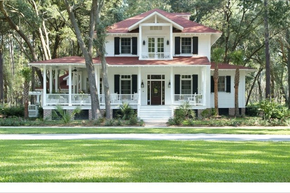 white house with red metal roof white house with red metal roof
