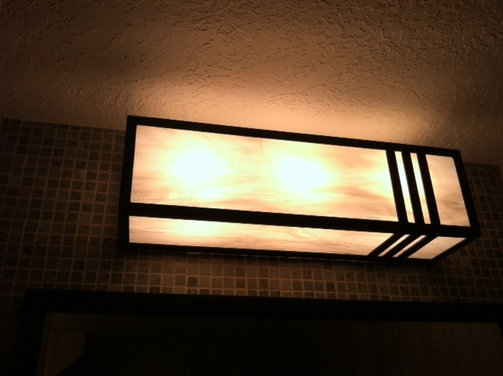 Bathroom Vanity Light Bar with Large Globes--can I cover them?