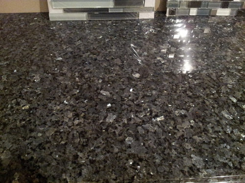 What backsplash will work with a black and silver glitter counter ...