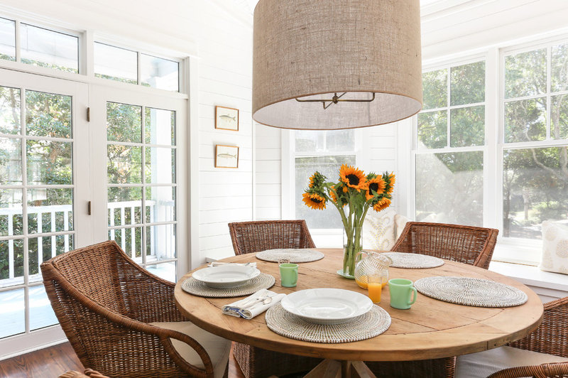 Beach Style Dining Room by Matthew Bolt Graphic Design