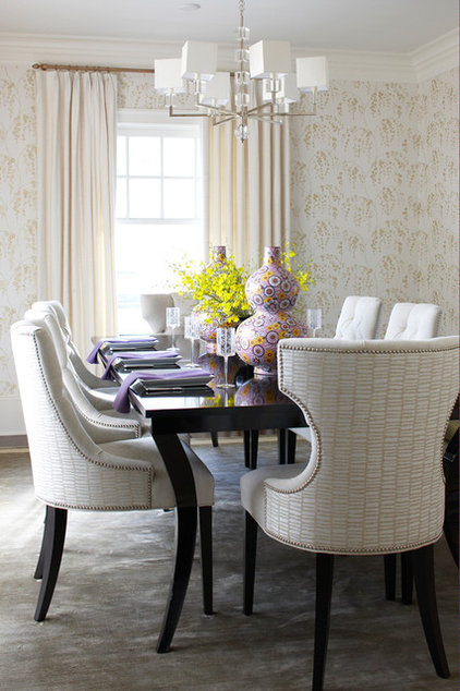 Pair two contrasting fabrics on an upholstered chair to bring edge ...