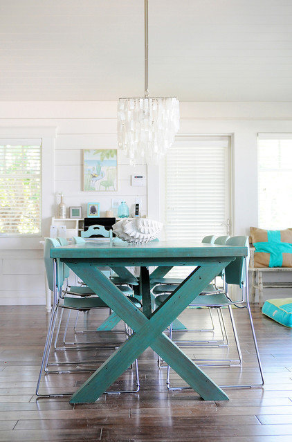 Beach Style Dining Room by The Blue Moon Trading Company