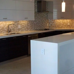 Custom made kitchen cabinets, white gloss wall cabinets and textured ...