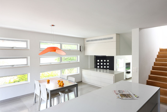 modern kitchen by Amitzi Architects