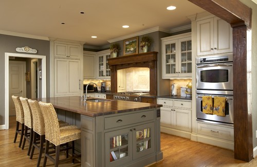 Housekaboodle -Gathering Place traditional kitchen with woven Seagrass that brightens it up and lends a coastal feel.