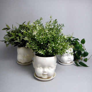 Porcelain baby doll head planter eclectic vases