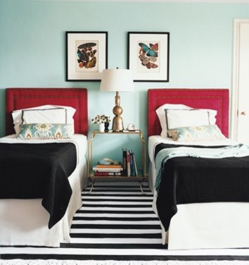Blue guest bedroom with red accents (Domino via House of Turquoise) contemporary bedroom