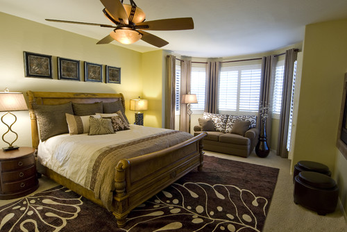 Traditional furnishings translated to a transitional look eclectic bedroom