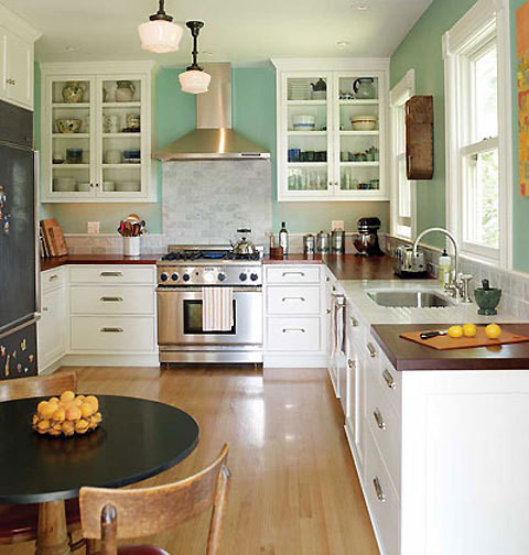 Dark wood countertops play so nicely with aqua-colored