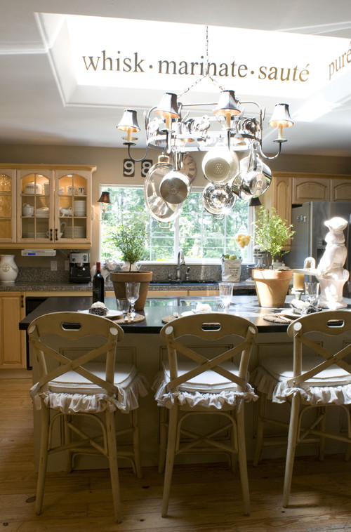 Melaine Thompson traditional french country kitchens design. This one has the signature ruffled chair covers