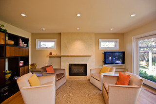 living room with travertine fireplace modern family room