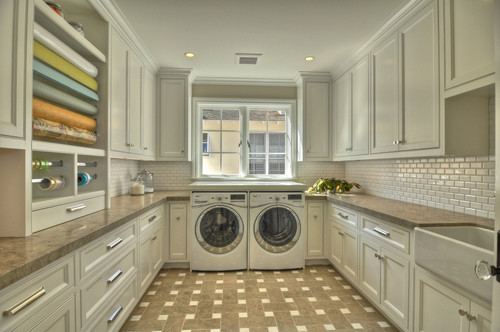 Laundry room: white cabinets, large with open space