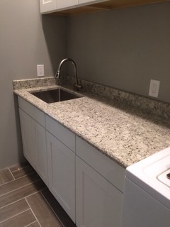 Safari Quartz -supplier Pental Quartz eased edge detail Laundry room