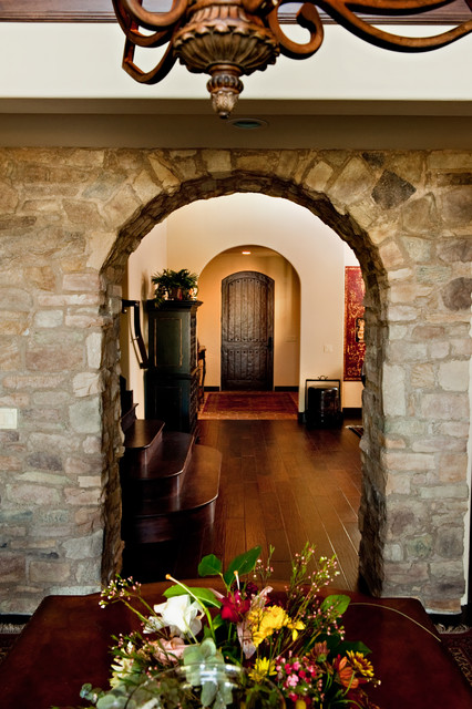 Rustic Stone Archway rustic-dining-room