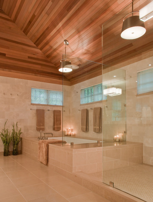 dark wood sloped  ceiling, loft bathroom, light wall tiles, light floor tiles, bathroom tiles, tiles mimic rough stone