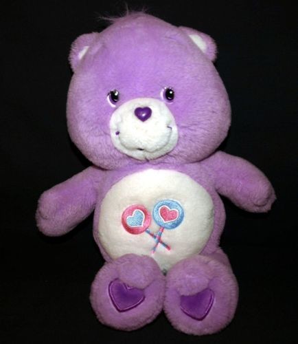 purple care bear with 2 lollipops