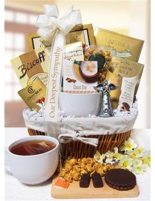 A tea party gift basket is ideal for the crisp autumn and winter season A gift basket with tea choices and biscuits