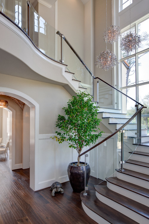 Contemporary Staircase with Glass Paneled Railing