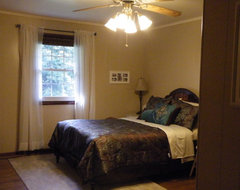 family for decades. The walls are covered in dark-ish wood paneling