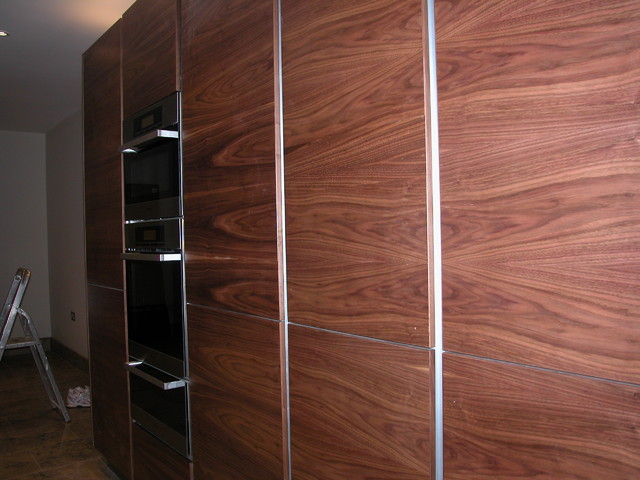 Handle-less kitchen, book-matched Walnut contemporary-kitchen
