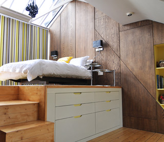 Bed with large storage below.