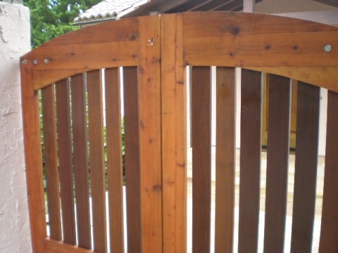 Entry to garden and front door eclectic patio
