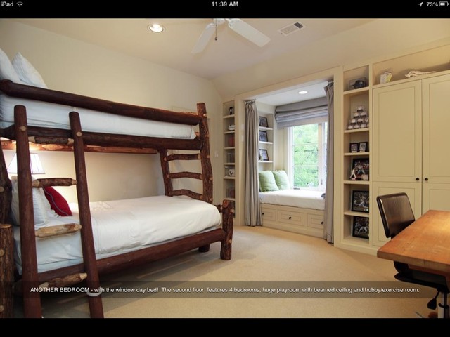... bed nook in window with built in closet and bookshelves around window