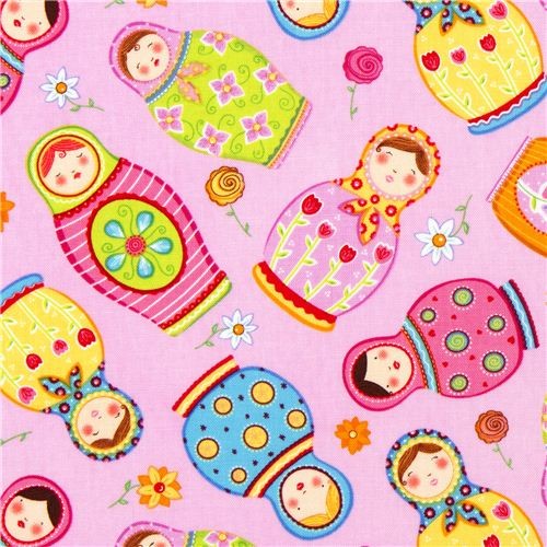 pink designer fabric with colourful Russian Matryoshka dolls Fabric