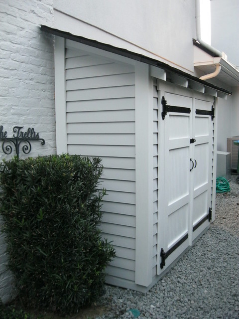 Small Storage along the side of a house traditional-garage-and-shed