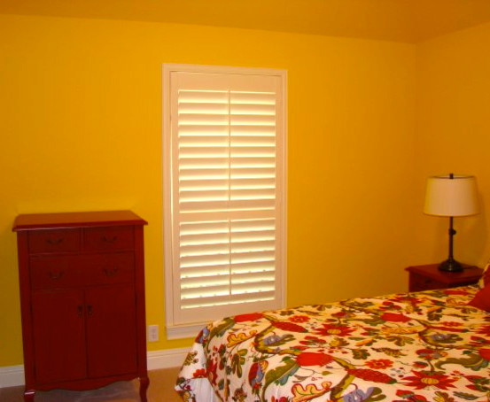 Custom Shutters traditional-window-treatments