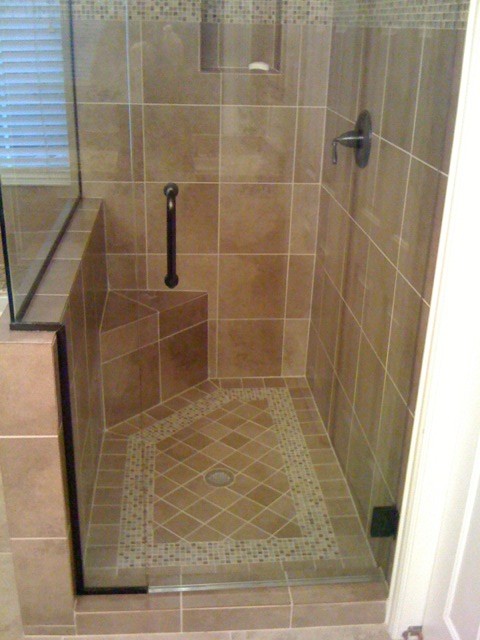 Tile shower floor with design.  Traditional  Bathroom 