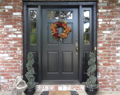 black door with camel trim and red brick house / for the home black door with camel trim and red brick house / for the home