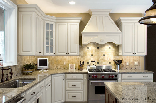 traditional kitchen with wooden hood insert