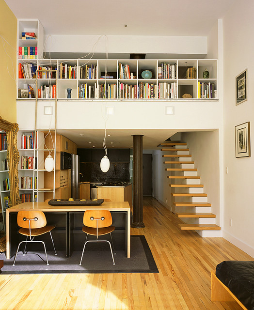 greenwich village loft with custom bookcases and library ladder 