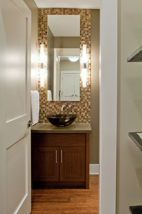 powder room with decorative tile