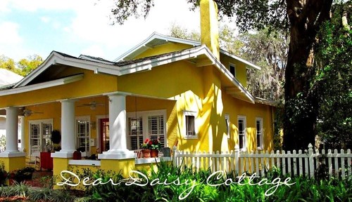 Colorful Cottage Decorating Ideas in red,yellow,blue,black & white, Fall in love with this bright yellow Bungalow filled with happy cottage decorating ideas.