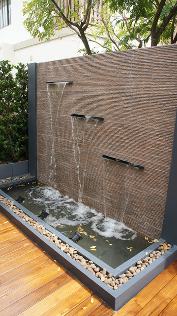 gold teak deck with modern water wall feature tropical other metro by thai garden design gold teak deck with modern water wall feature tropical other metro by thai garden design