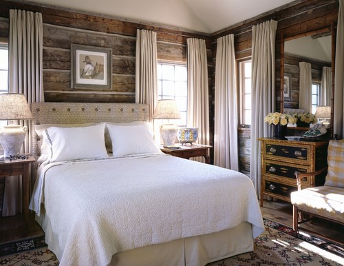  Reclaimed wood bedroom walls. Stunning contrast with the cream and white neutral decor!