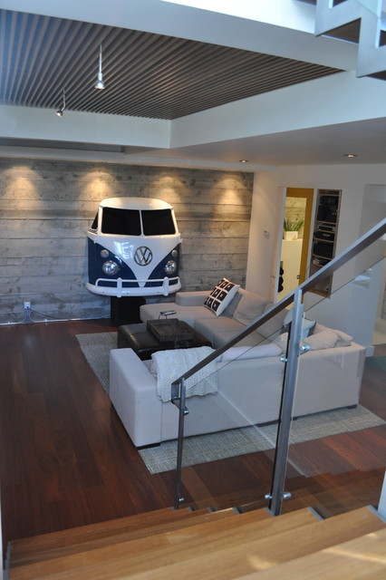 Basement addition - exposed concrete walls, wood grille ceiling